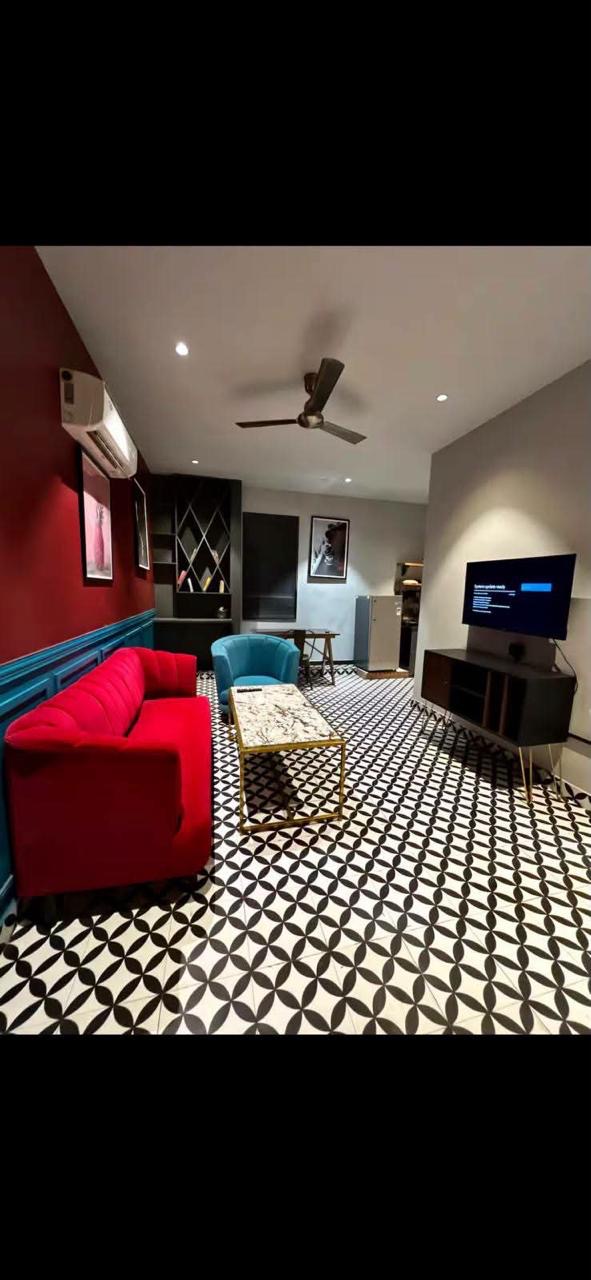 Heritage-styled lounge with patterned tile flooring at a Polaris Collection stay