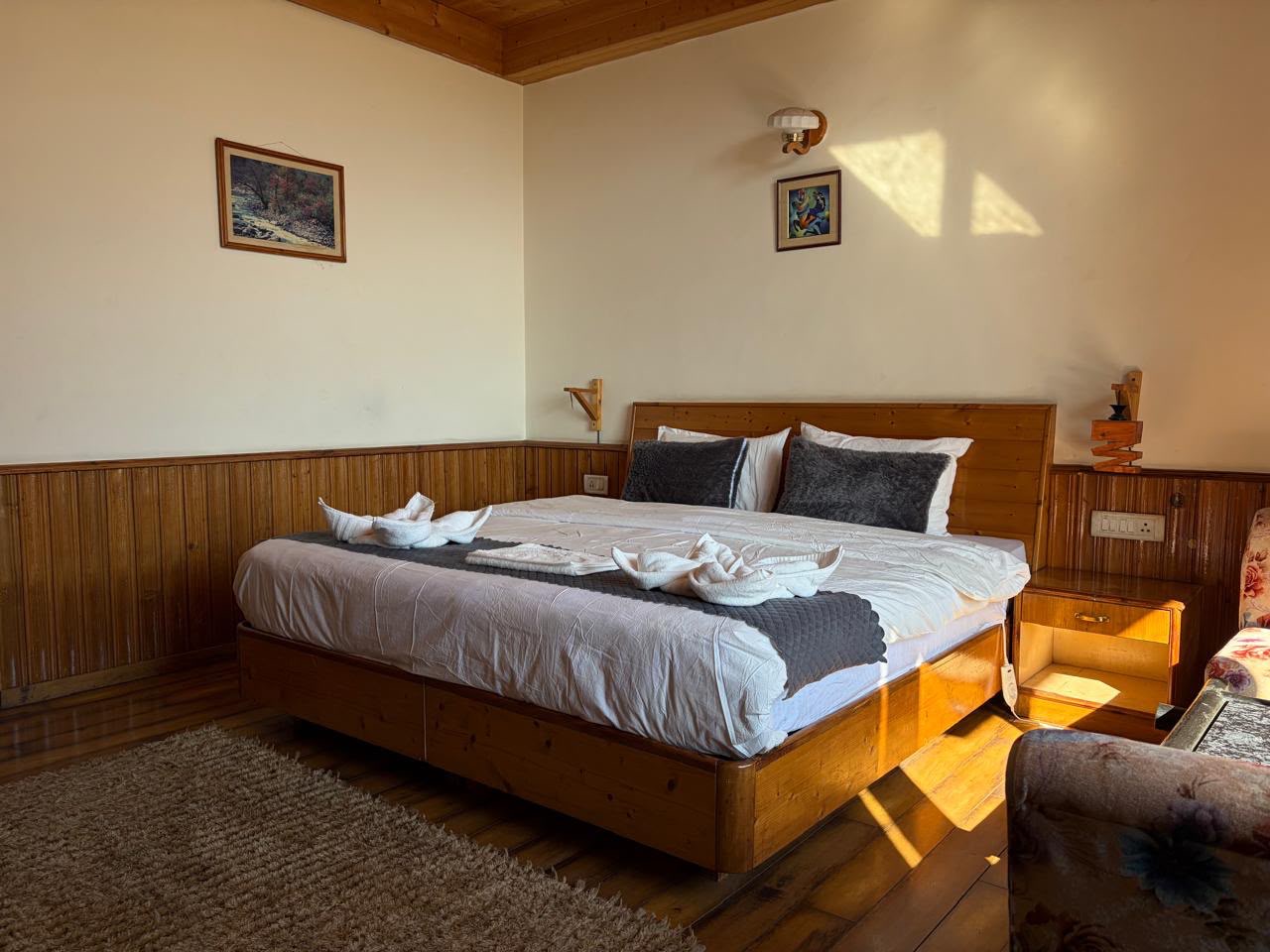 Wood-panelled suite at an upcoming stay in Manali