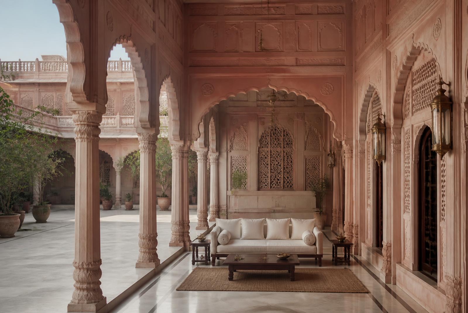 Heritage haveli courtyard arcade in Jaipur with carved sandstone arches